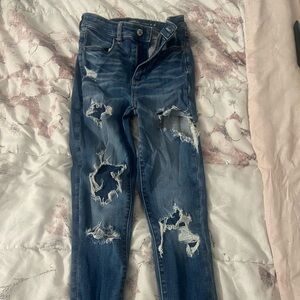 dark wash ripped american eagle jeans